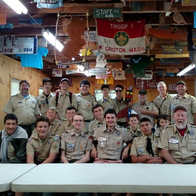 The Troop Gathered In Front of Their Troop Dining Hall Sign